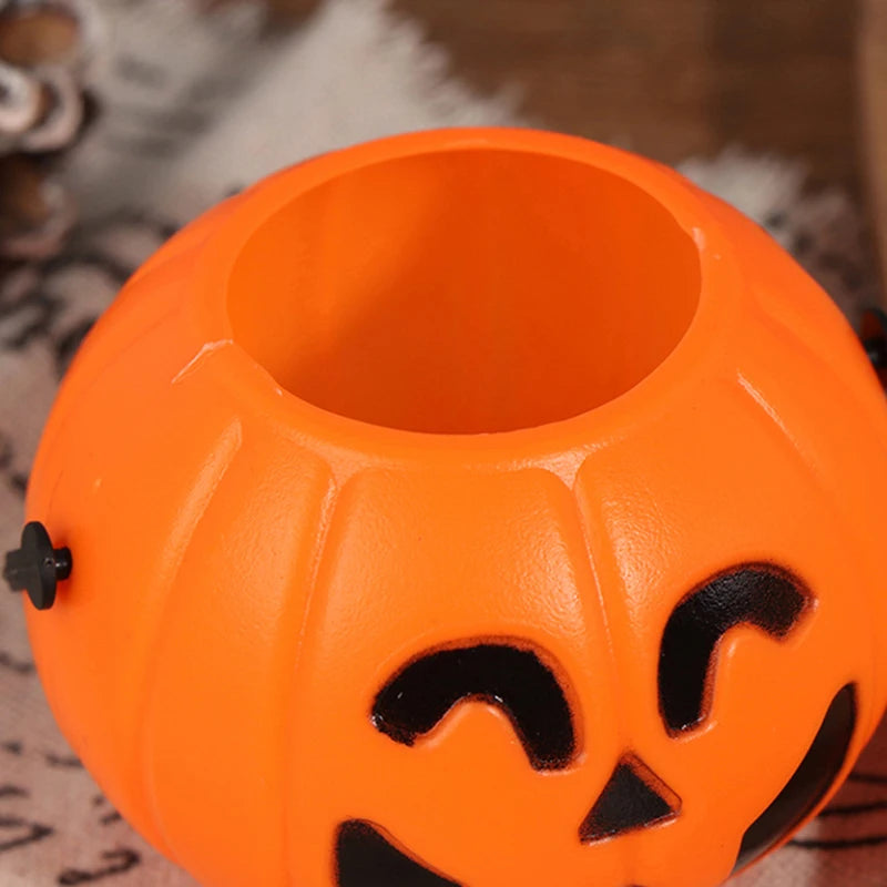 Jack-O'-Lantern Pumpkin Candy Bucket – macro close-up of the rim, inside wall and black face print