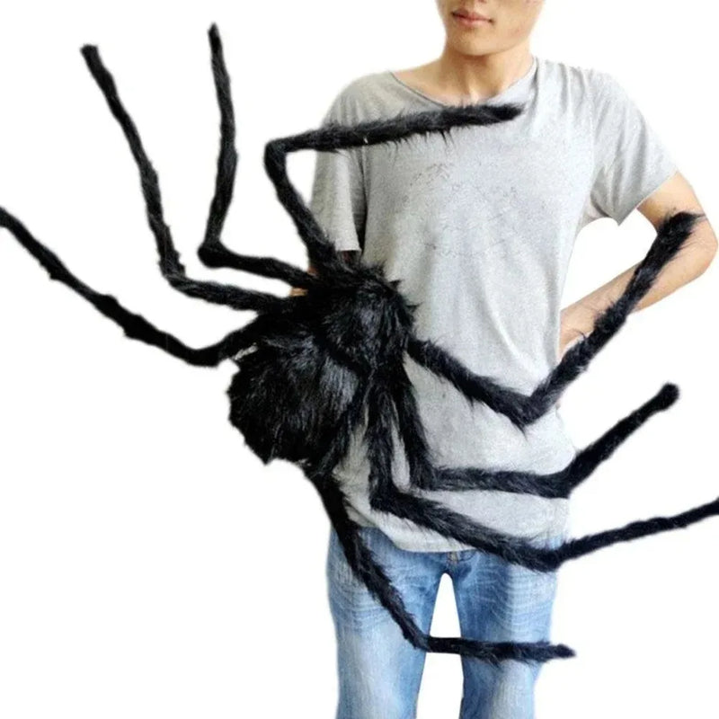 Giant Plush Halloween Spider – man holding a giant black hairy spider