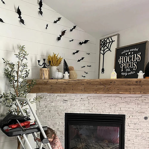 Halloween Bat Wall Decor – black bats flying up a white shiplap wall above a fireplace mantel