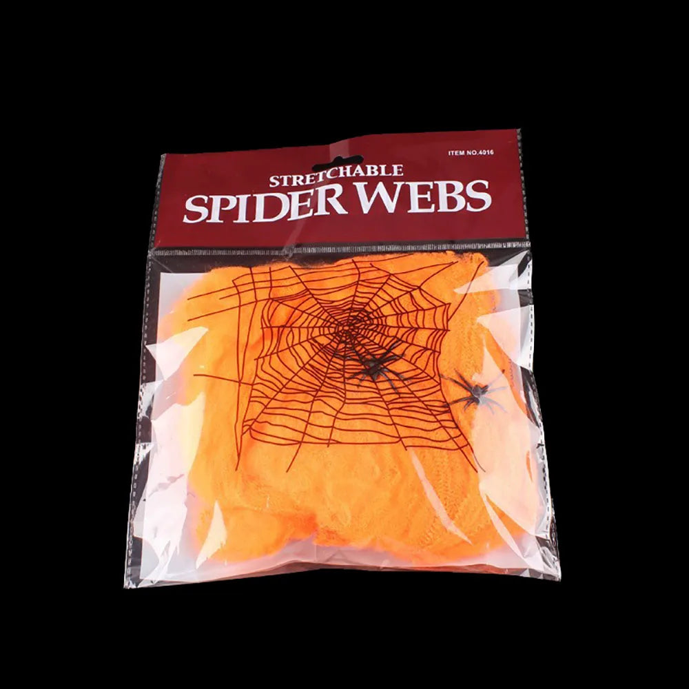 Stretchy Spider Web – orange web in its bag with small plastic spiders