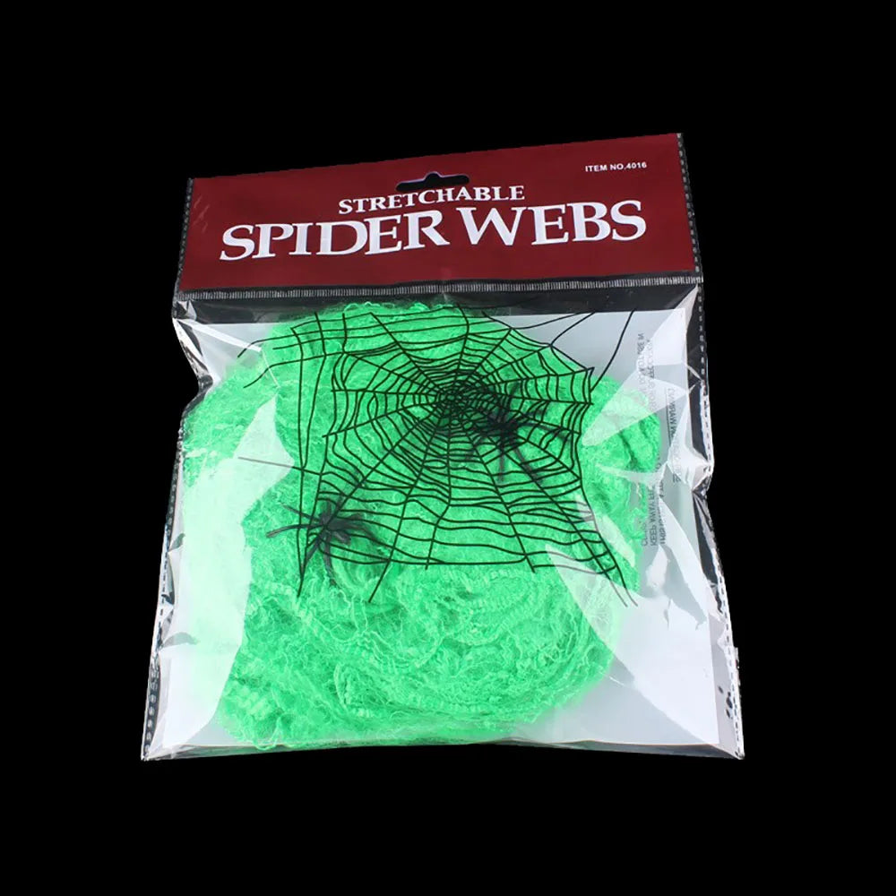 Stretchy Spider Web – green web in its bag with small plastic spiders