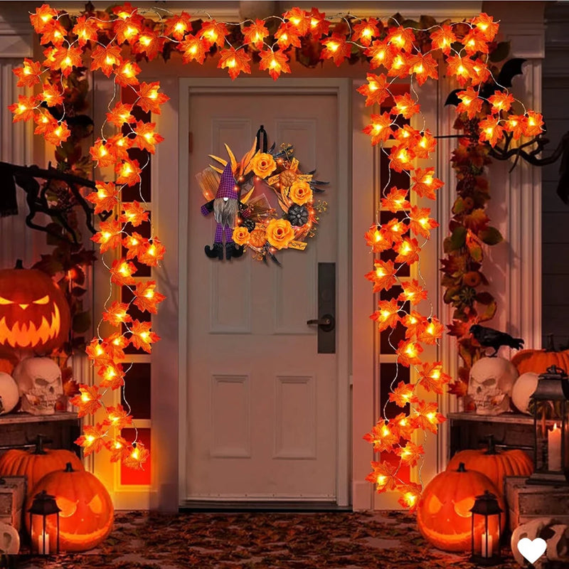Maple Leaf LED Garland Lights – lit maple leaf garland framing a front door at night