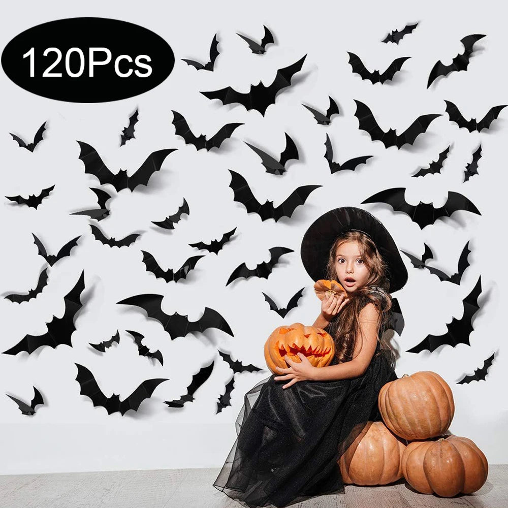 Halloween Bat Wall Decor – black 3D bats covering a white wall behind a child in a witch costume holding a jack-o'-lantern