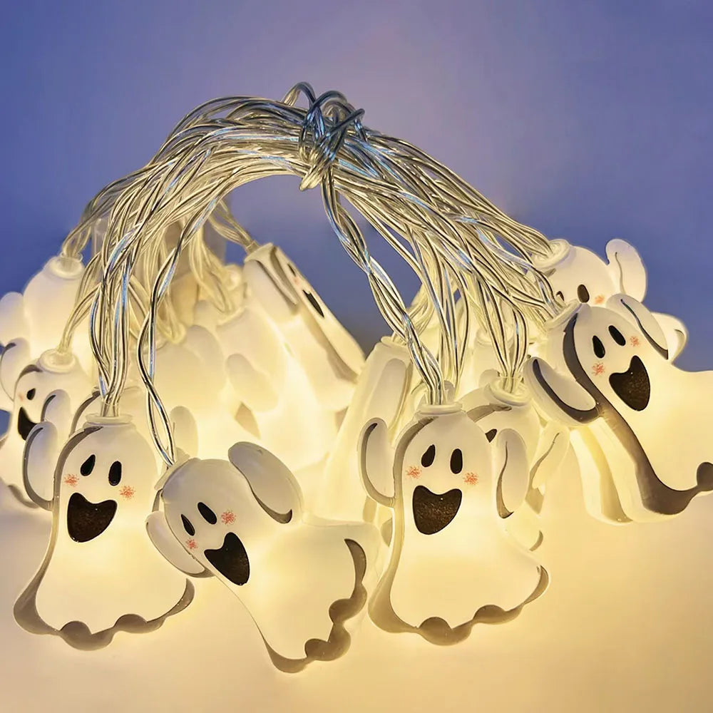 Halloween String Lights – ghost string lit up, with its battery box