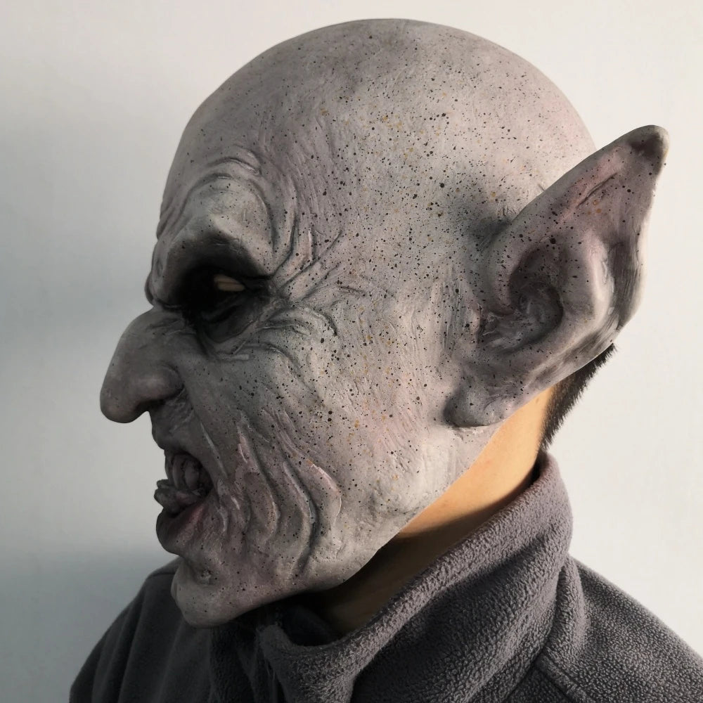 Vampire Latex Mask – real photo, left side profile showing the pointed ear and wrinkled skin