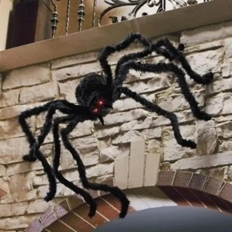 Giant Plush Halloween Spider – black spider crawling on a stone wall