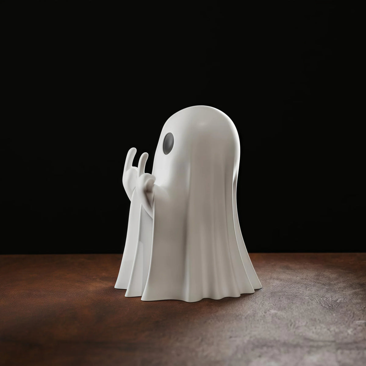 Middle Finger Ghost Figurine – side view of the white ghost and its raised hands