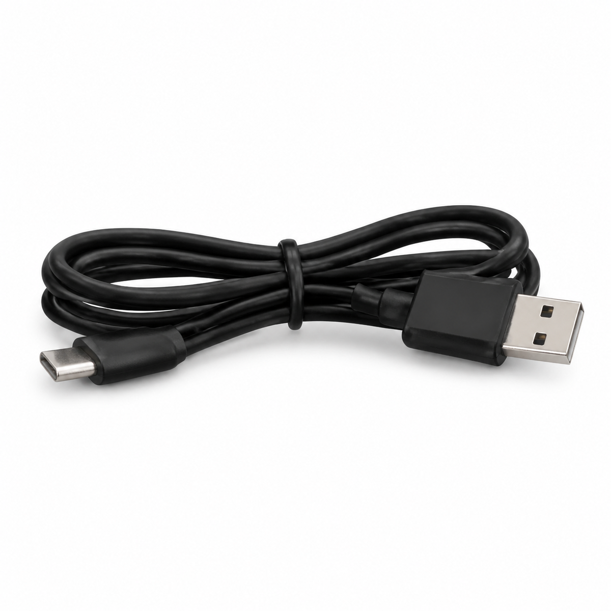 The fan powered by its USB-C cable from a car socket